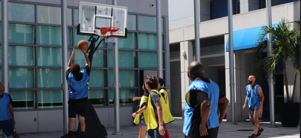 Students playing basketball at Padron Campus